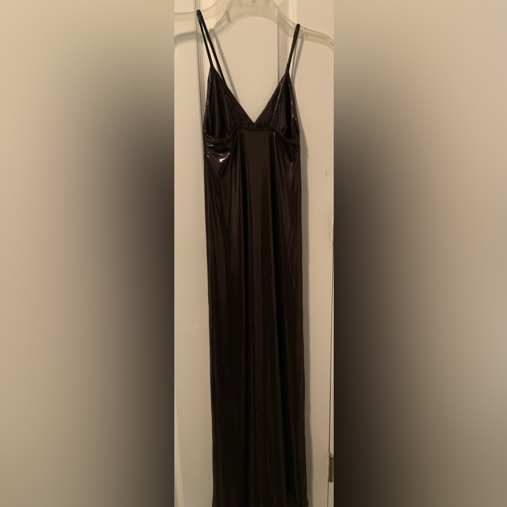 Norma Kamali's dress flattering stretch blend and features spaghetti straps. - Picture 3 of 4
